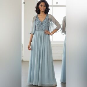 Midnight velvet gown blue v neck with mesh sleeve attachment beaded